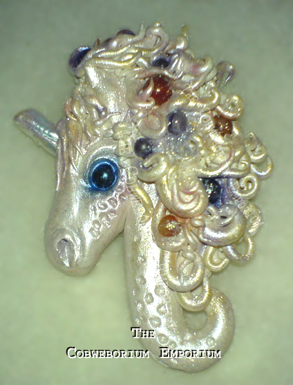 The Enchanted Unicorn – a gem set focal pendant