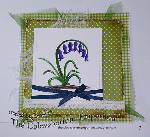 See the 'gathered'/folded organza?   I added a rough cut piece of muslin behind the painted bluebells, and added some deep blue paper ribbon, which I wrapped around the watercolour card twice and added the bow.   I then added some cotton lace to the bottom of the card.